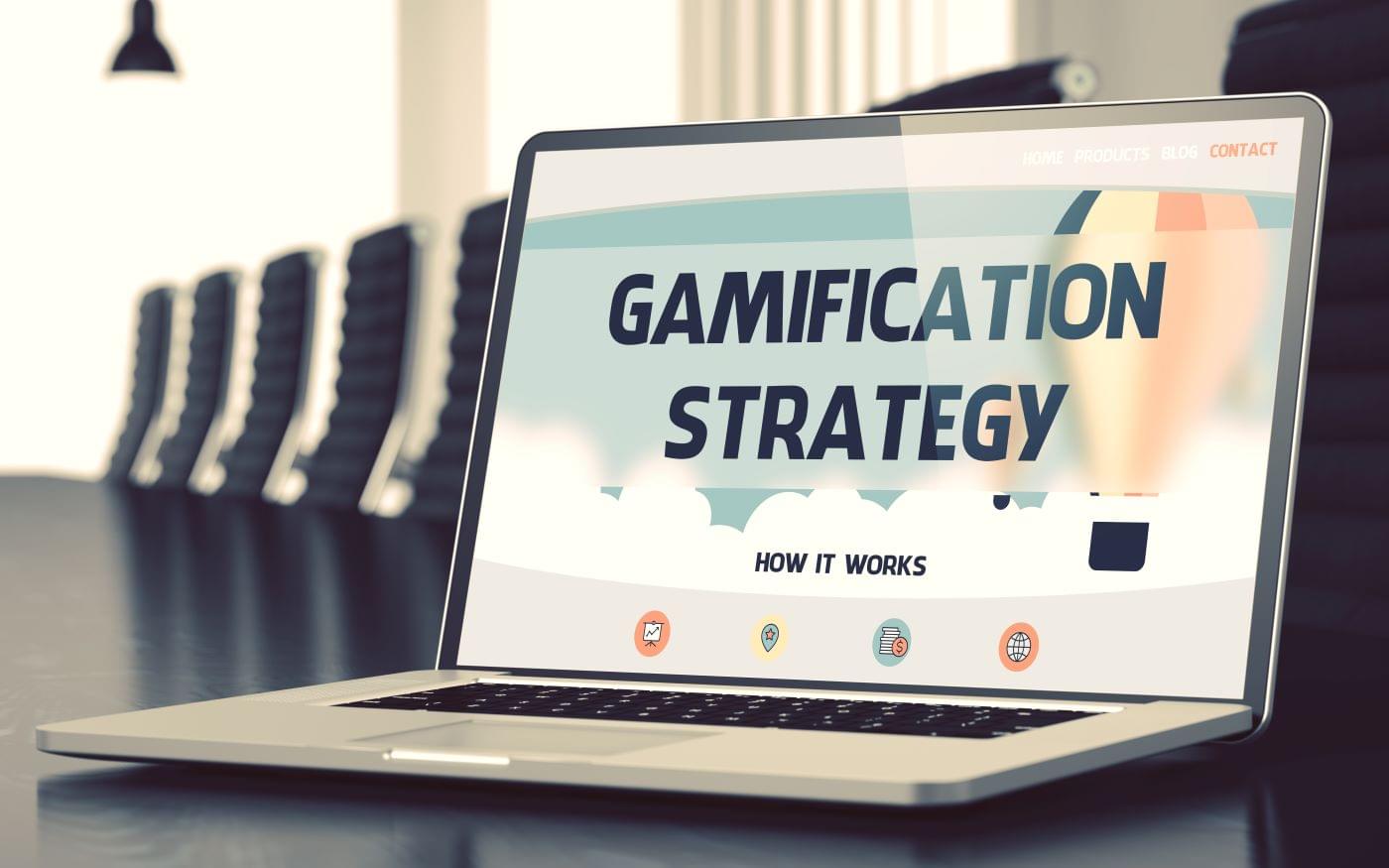 Picture of a laptop with the words "gamification strategy" on the screen