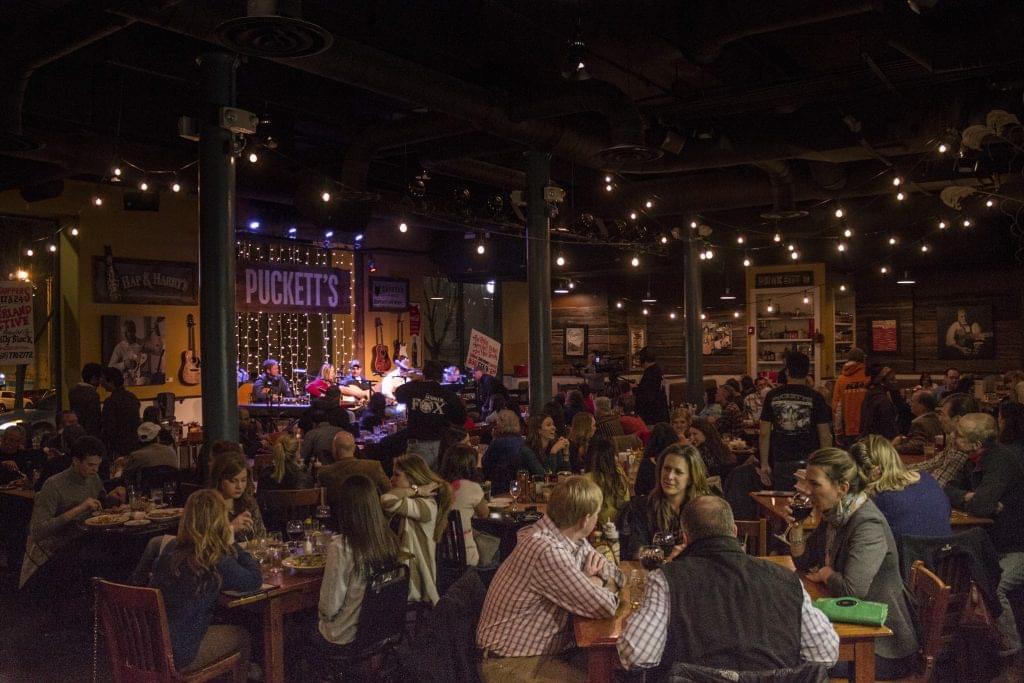Photo of a songwriters round at Puckett's in Nashville.